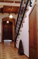 a hallway with a staircase in a house at Hotel Posada Casas Viejas in Benalup Casas Viejas