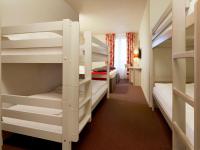 Cama o camas de una habitación en Campanile Val de France