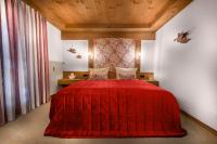 Postel nebo postele na pokoji v ubytování Dreimäderlhaus - Das vegetarische Boutique Hotel