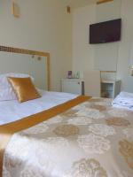 Łóżko lub łóżka w pokoju w obiekcie Hotel Court Wellness&Spa