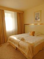 Łóżko lub łóżka w pokoju w obiekcie Hotel Court Wellness&Spa