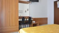 Posteľ alebo postele v izbe v ubytovaní Hotel Mignon