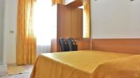 Posteľ alebo postele v izbe v ubytovaní Hotel Mignon