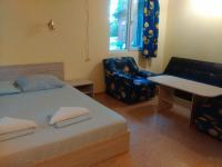 Postel nebo postele na pokoji v ubytování Nimpha Bungalows