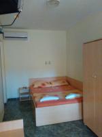 Postel nebo postele na pokoji v ubytování Nimpha Bungalows