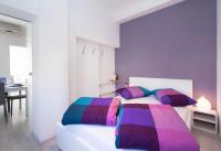 Posteľ alebo postele v izbe v ubytovaní Apartments Aida