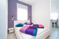 Posteľ alebo postele v izbe v ubytovaní Apartments Aida