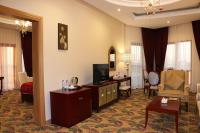 Red Castle Hotelにあるテレビまたはエンターテインメントセンター