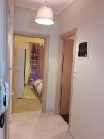 Łóżko lub łóżka w pokoju w obiekcie City House Apartment