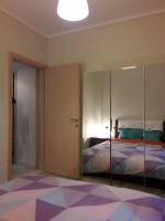 Łóżko lub łóżka w pokoju w obiekcie City House Apartment