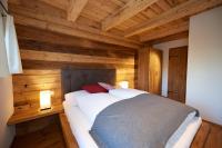 Posteľ alebo postele v izbe v ubytovaní Chalets Almidylle