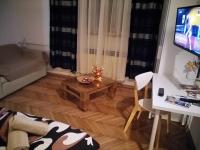 Televízia a/alebo spoločenská miestnosť v ubytovaní Apartmani Stonewood