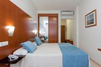 Postel nebo postele na pokoji v ubytování Hotel Verol