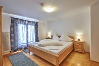 Łóżko lub łóżka w pokoju w obiekcie Ferienhaus Oberlengau