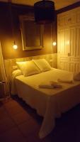 Postel nebo postele na pokoji v ubytování Palacio Doñana , Rural & Luxury