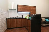Kuchyňa alebo kuchynka v ubytovaní Apartamenty Mikubo Wrocław