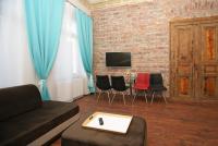 Televízia a/alebo spoločenská miestnosť v ubytovaní Apartamenty Mikubo Wrocław