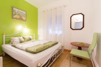 Posteľ alebo postele v izbe v ubytovaní Apartments Aida