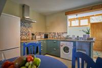 A kitchen or kitchenette at Villa Palmeras Beach Puerto del Carmen
