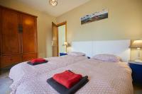 A bed or beds in a room at Villa Palmeras Beach Puerto del Carmen