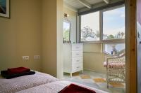 A bed or beds in a room at Villa Palmeras Beach Puerto del Carmen