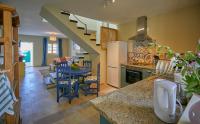 A kitchen or kitchenette at Villa Palmeras Beach Puerto del Carmen