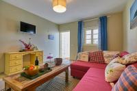 A television and/or entertainment centre at Villa Palmeras Beach Puerto del Carmen