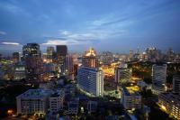 a view of a city at night with at Bandara Suites Silom, Bangkok in Bangkok