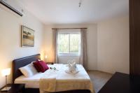 Postel nebo postele na pokoji v ubytování Chloraka Terrace Apartments