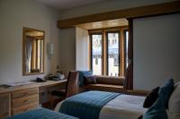 Ein Bett oder Betten in einem Zimmer der Unterkunft Canterbury Cathedral Lodge