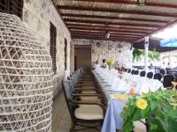 Reštaurácia alebo iné gastronomické zariadenie v ubytovaní Guesthouse Pomena
