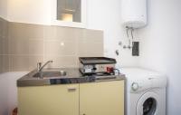Kuchyňa alebo kuchynka v ubytovaní Apartman Prima