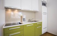 Kuchyňa alebo kuchynka v ubytovaní Apartman Prima