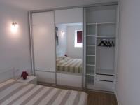 Posteľ alebo postele v izbe v ubytovaní Apartman Prima