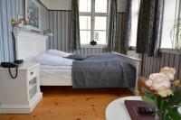Postel nebo postele na pokoji v ubytování Hotel Ærø