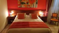 Łóżko lub łóżka w pokoju w obiekcie Hotel Borgo Antico