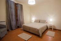 A bed or beds in a room at Il Borgo di San Gervasio