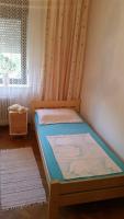 Postel nebo postele na pokoji v ubytování Apartment Tatjana