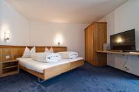 Hotel Rössli Tufertschwilにあるベッド
