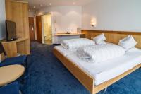 Hotel Rössli Tufertschwilにあるベッド