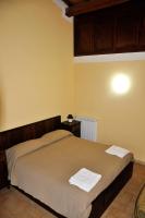 Posteľ alebo postele v izbe v ubytovaní Agriturismo Nociquerceto