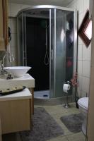 a bathroom with a shower and a sink and a toilet at Best Room in Town in Karakusunlar Köyü