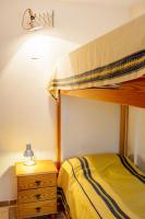 A bed or beds in a room at Casa Charlotte
