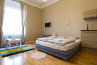 Łóżko lub łóżka w pokoju w obiekcie Apartments Downtown