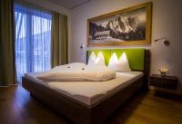 Posteľ alebo postele v izbe v ubytovaní Apartments Dolomit-Royal