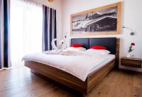 Posteľ alebo postele v izbe v ubytovaní Apartments Dolomit-Royal