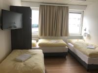 Łóżko lub łóżka w pokoju w obiekcie Montagehotel Bed & Steel