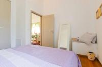 Posteľ alebo postele v izbe v ubytovaní Apartment Varga