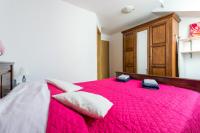 Posteľ alebo postele v izbe v ubytovaní Lily's Apartments