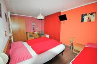 A bed or beds in a room at Garni Gimea